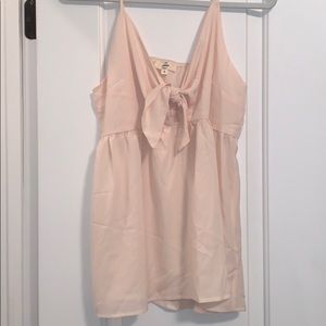 Cream color spaghetti strap tank with bow